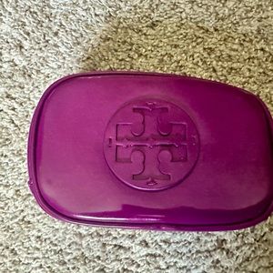 Tory Burch makeup bag in Purple/plum. Some makeup stains inside.